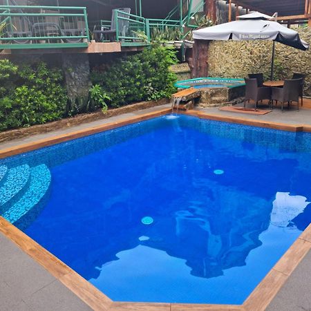 Mb'S Garden Inn Мактан Экстерьер фото