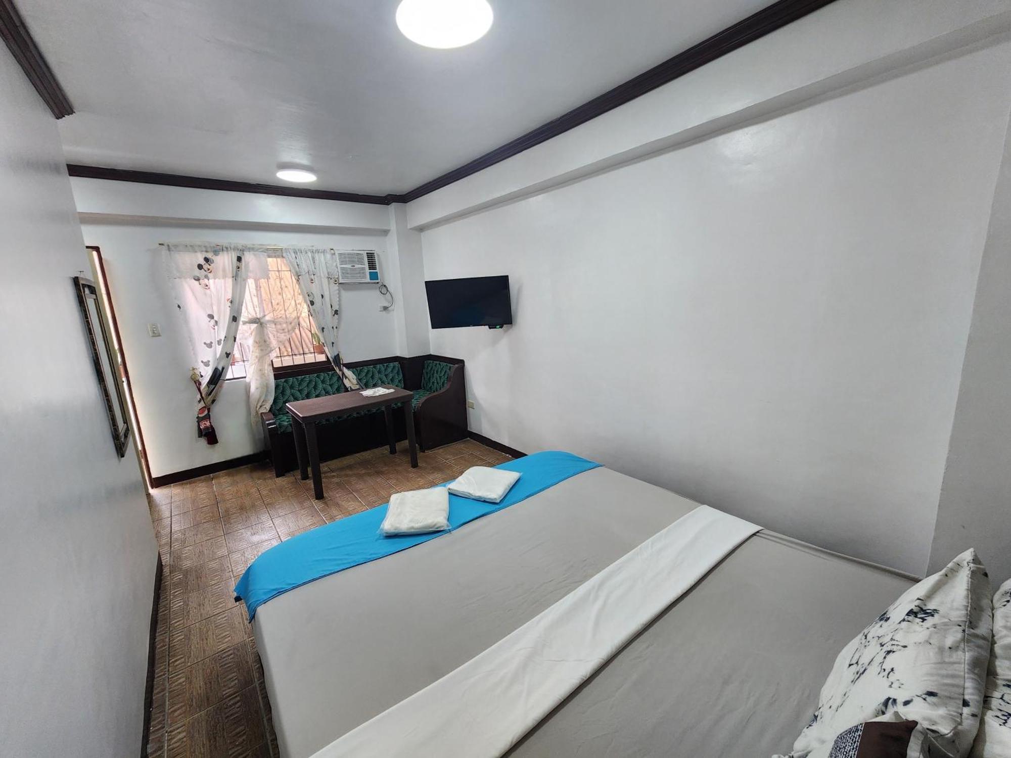 Mb'S Garden Inn Мактан Экстерьер фото
