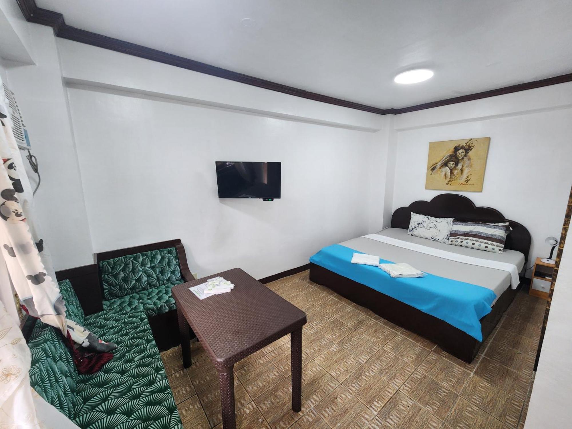 Mb'S Garden Inn Мактан Экстерьер фото